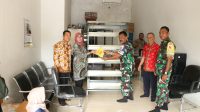 Wujud Sinergi, Dinas Perpustakaan Sidoarjo Serahkan Bantuan Buku untuk Desa Penambangan melalui Satgas TMMD ke-120